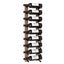 Wooden and metal wine rack holding nine bottles of wine on a white background